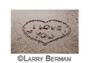 "i love you" heart in sand sequence of three photographs